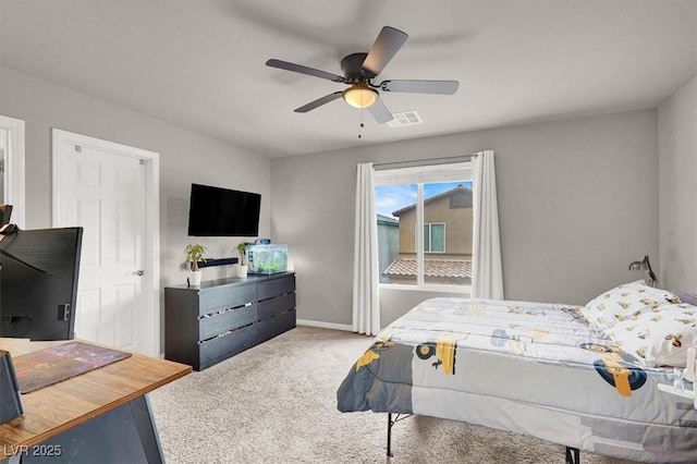 bedroom with visible vents, baseboards, a ceiling fan, and carpet floors