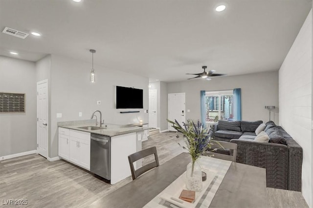 interior space featuring recessed lighting, baseboards, light wood-style floors, and a ceiling fan