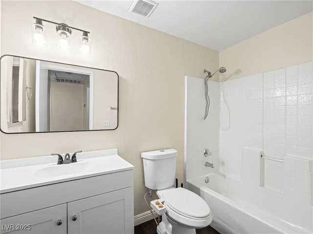 full bath featuring visible vents, toilet,  shower combination, baseboards, and vanity