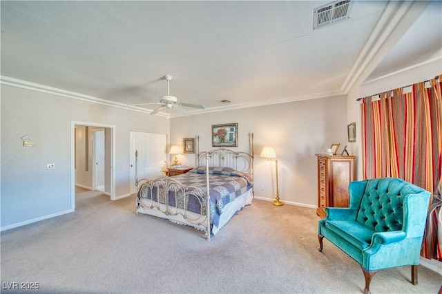 carpeted bedroom with ceiling fan, baseboards, visible vents, and ornamental molding