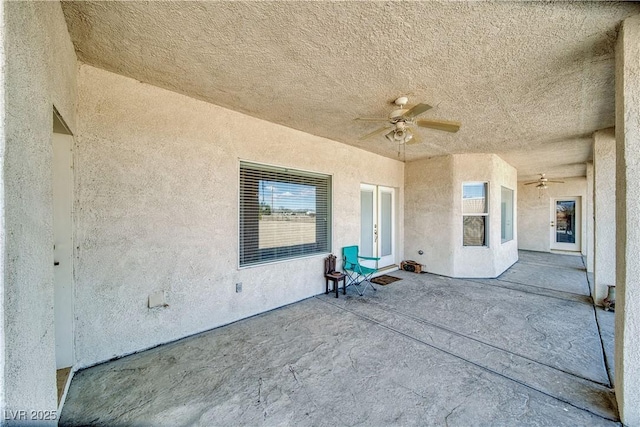 view of patio / terrace featuring a ceiling fan