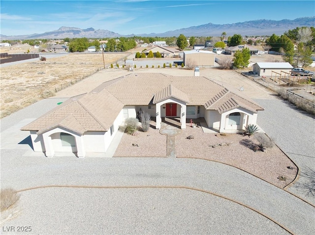 bird's eye view with a mountain view