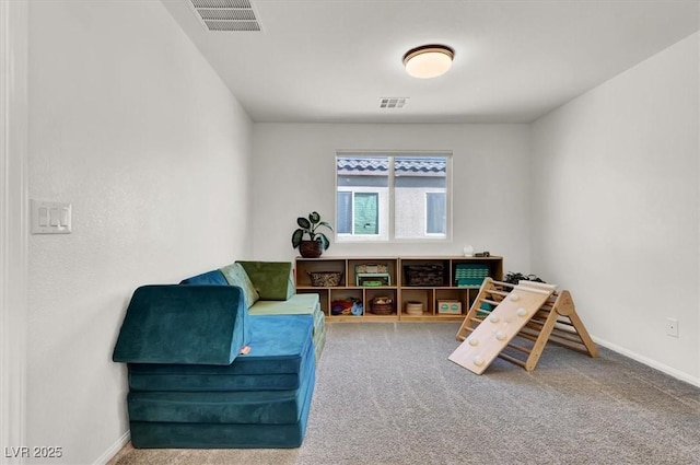 recreation room with visible vents, carpet flooring, and baseboards