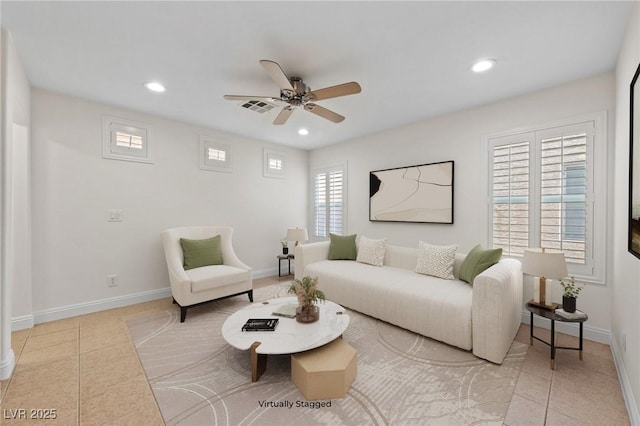 tiled living area featuring visible vents, recessed lighting, baseboards, and ceiling fan