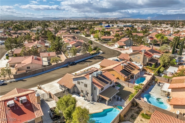 drone / aerial view with a mountain view and a residential view