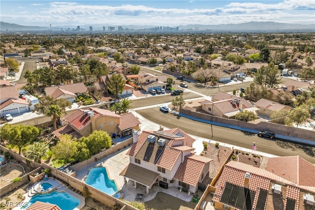 aerial view featuring a mountain view and a residential view