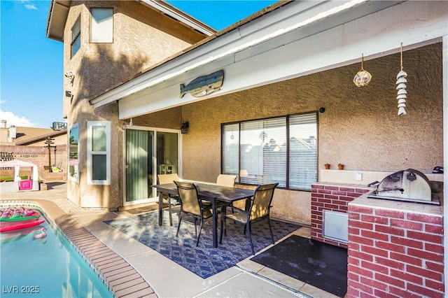 3258 Del Marino St, Las Vegas, NV 89121 - view of patio / terrace with outdoor dining area and exterior kitchen