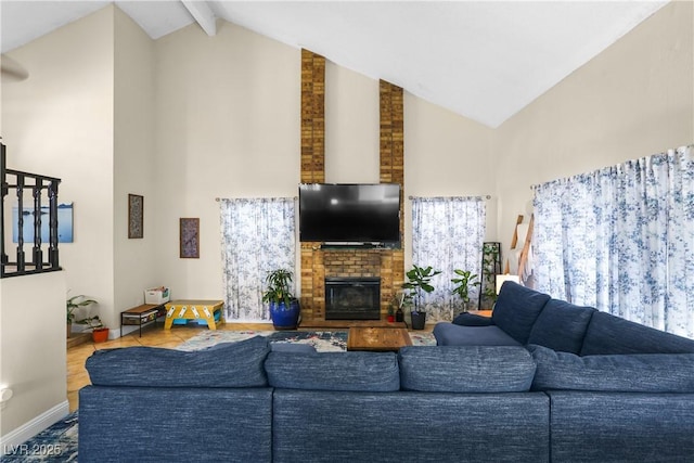 3258 Del Marino St, Las Vegas, NV 89121 - living area featuring high vaulted ceiling, a fireplace, and beamed ceiling