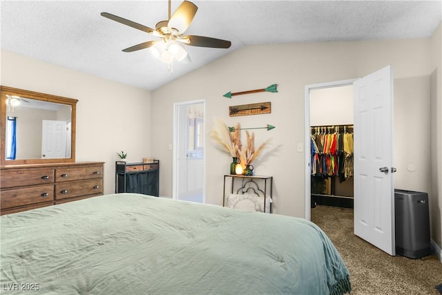 3258 Del Marino St, Las Vegas, NV 89121 - carpeted bedroom featuring vaulted ceiling, a walk in closet, a ceiling fan, and ensuite bath