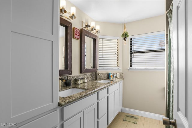 3258 Del Marino St, Las Vegas, NV 89121 - full bath featuring baseboards and double vanity