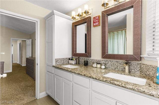 3258 Del Marino St, Las Vegas, NV 89121 - bathroom with double vanity and baseboards