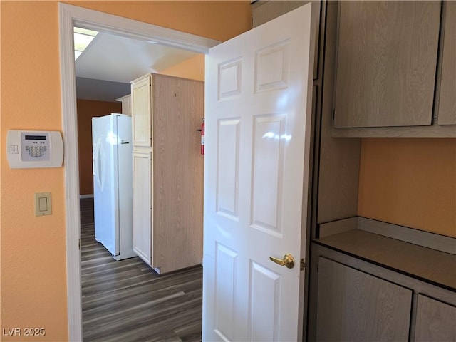 3117 Brightridge Dr, Las Vegas, NV 89134 - kitchen with freestanding refrigerator and dark wood-type flooring