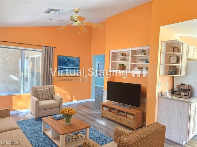 3117 Brightridge Dr, Las Vegas, NV 89134 - living room with ceiling fan, light wood-style floors, and high vaulted ceiling