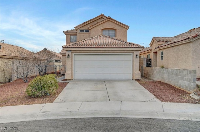 view of front of house featuring stucco siding, fence, concrete driveway, a garage, and a tiled roof