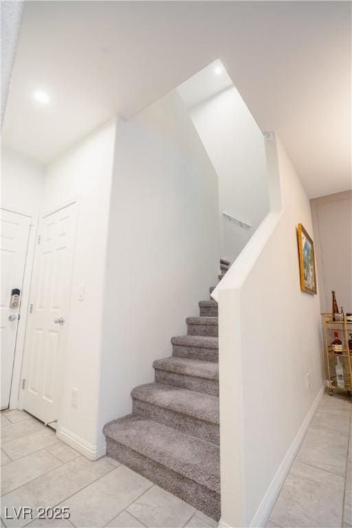 stairway with baseboards