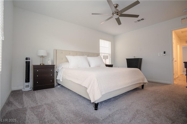 bedroom with baseboards, visible vents, carpet floors, and ceiling fan