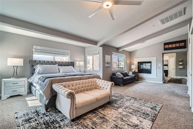 carpeted bedroom with vaulted ceiling with beams, a ceiling fan, visible vents, and baseboards