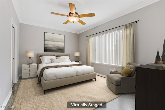 bedroom with ceiling fan, baseboards, and ornamental molding