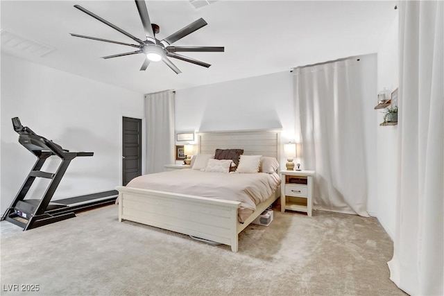 bedroom featuring visible vents, a ceiling fan, and carpet flooring