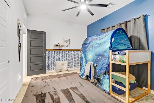 bedroom with visible vents and ceiling fan