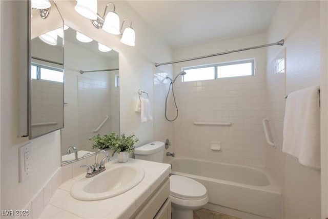 full bathroom featuring plenty of natural light, toilet, shower / washtub combination, and vanity