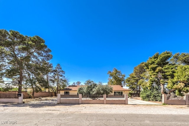 10615 Rancho Destino Rd, Las Vegas, NV 89183 - view of front of home with a fenced front yard