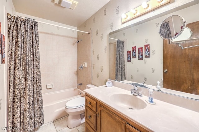 10615 Rancho Destino Rd, Las Vegas, NV 89183 - bathroom featuring vanity, wallpapered walls, shower / bath combo, tile patterned floors, and toilet