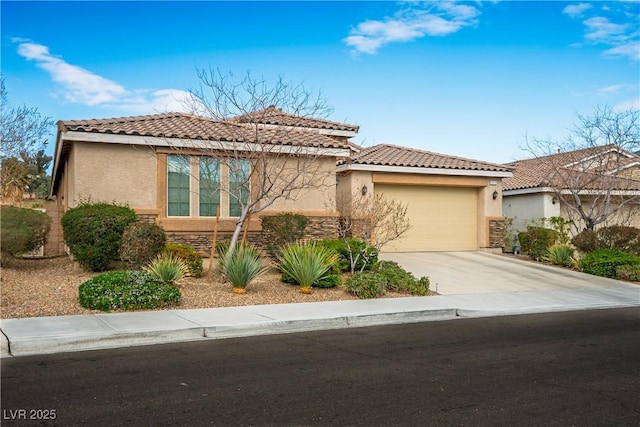 view of front of house with stucco siding, stone siding, driveway, and a tiled roof