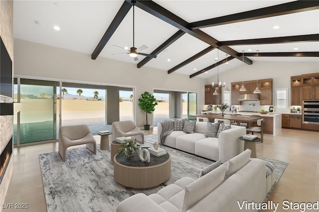 living room with beamed ceiling, high vaulted ceiling, a ceiling fan, a lit fireplace, and light tile patterned floors