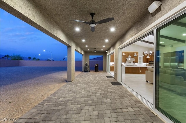 view of patio featuring visible vents, area for grilling, and ceiling fan