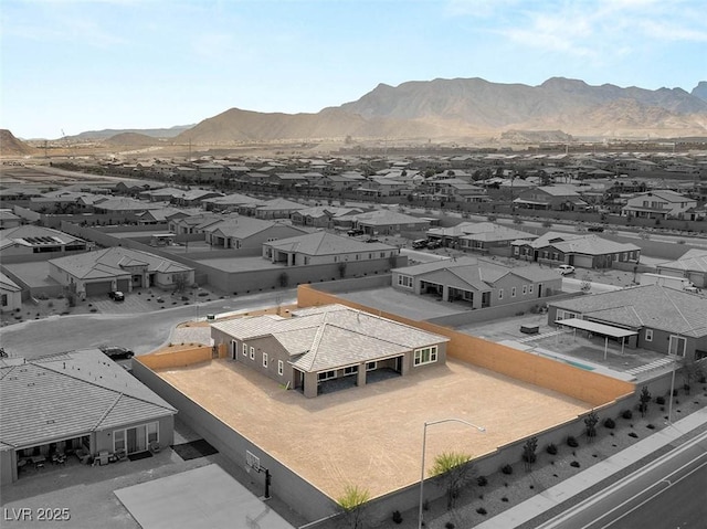 aerial view with a mountain view and a residential view