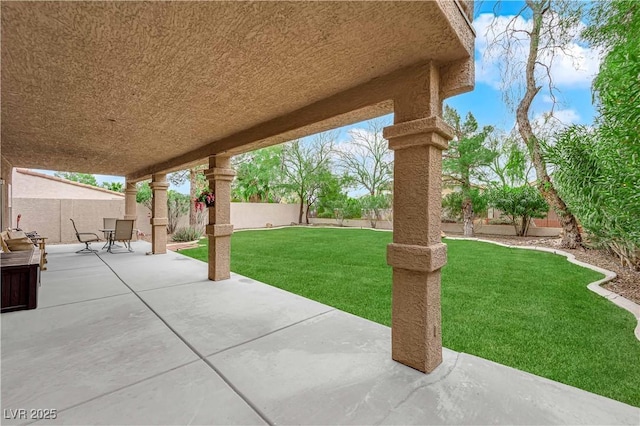 view of patio with a fenced backyard