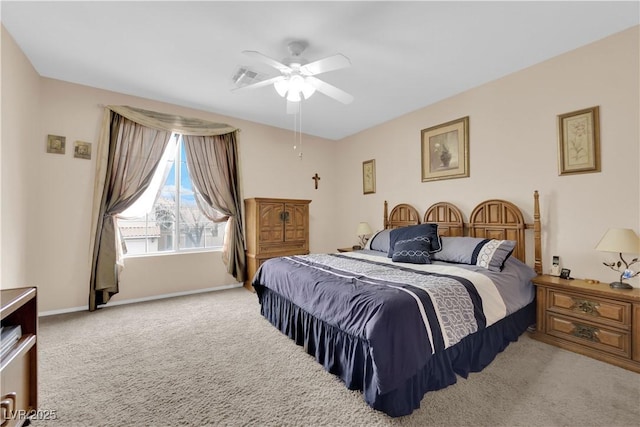 bedroom with baseboards, carpet, and a ceiling fan