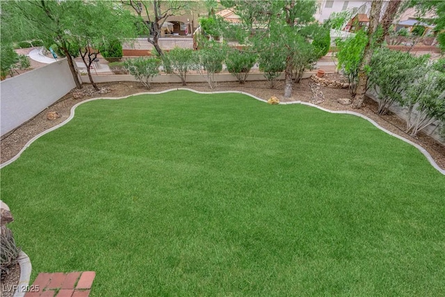 view of yard with fence