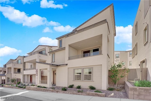 view of front of house featuring stucco siding