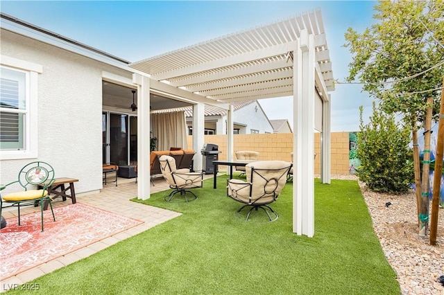 exterior space with fence, a pergola, and grilling area