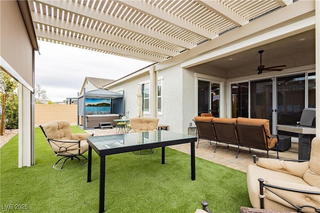 view of patio / terrace with a ceiling fan, fence, and a pergola