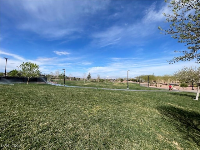 view of home's community featuring a yard