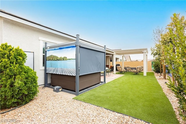 view of yard with a patio area, a fenced backyard, and a pergola