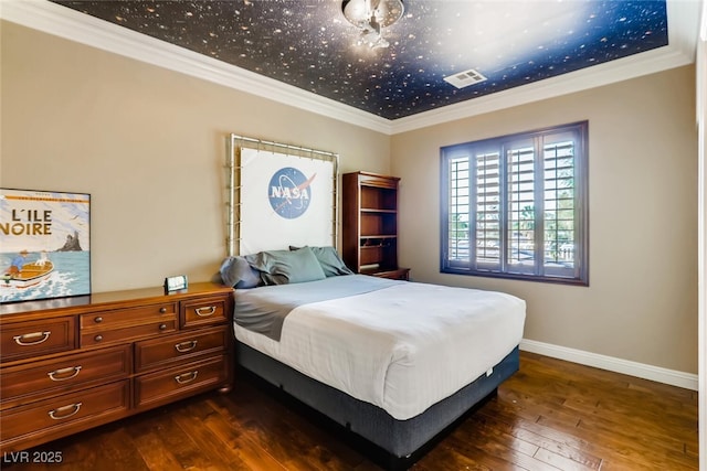 bedroom featuring dark wood-style floors, visible vents, baseboards, and ornamental molding