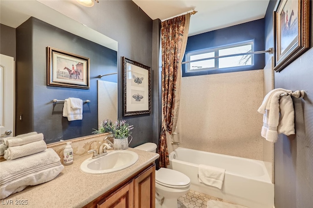 bathroom with vanity, toilet, and shower / bath combo