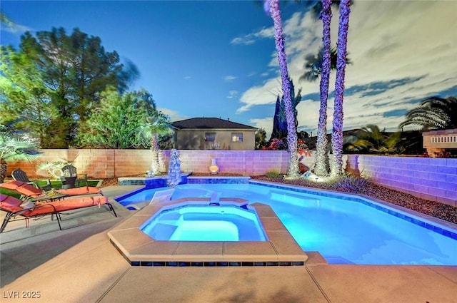 view of swimming pool featuring a fenced in pool, an in ground hot tub, a fenced backyard, and a patio