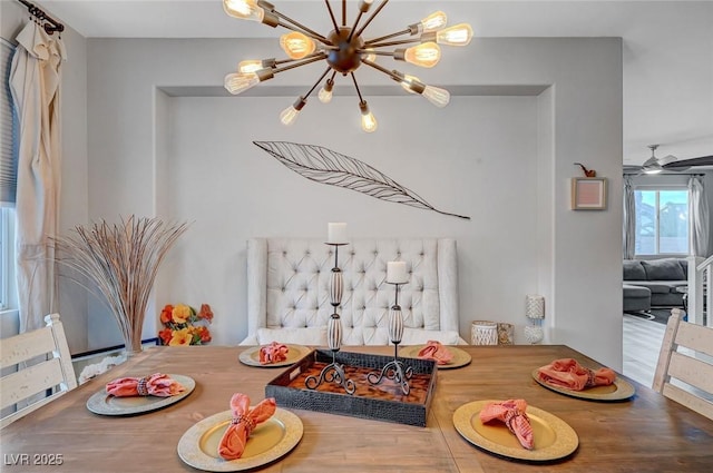 dining area featuring an inviting chandelier