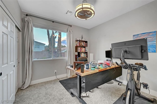 office area featuring carpet, visible vents, and baseboards