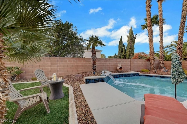 view of pool featuring a patio area, a fenced in pool, and a fenced backyard