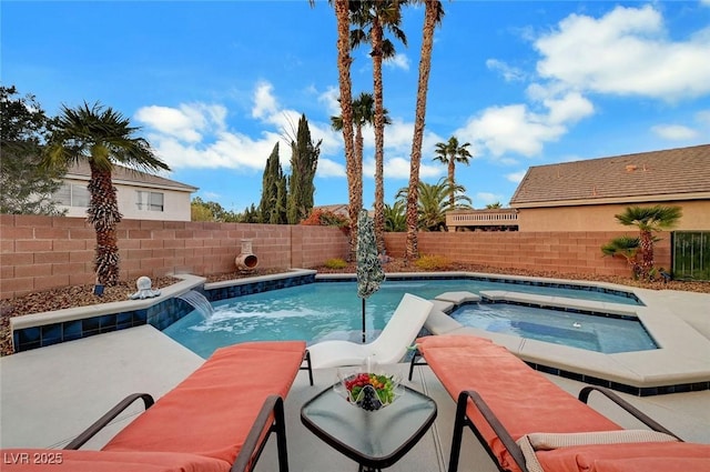 view of swimming pool featuring an in ground hot tub, a fenced backyard, and a fenced in pool