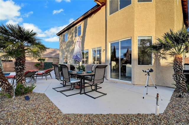 view of patio featuring fence