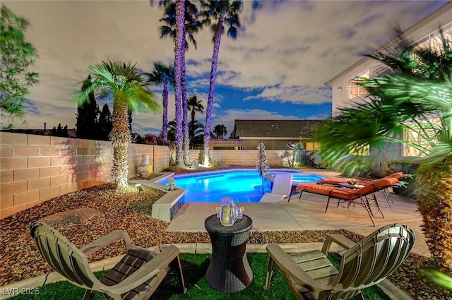 view of pool featuring a fenced in pool, a patio, and a fenced backyard