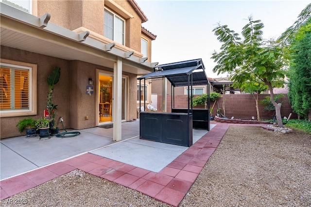 view of patio / terrace with fence