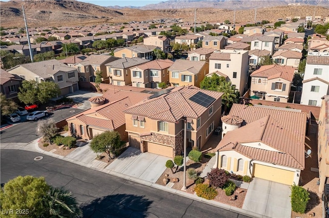 aerial view featuring a mountain view and a residential view